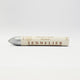 A single Sennelier oil pastel crayon against a white background, displaying the brand name and the word 'Oil Pastel' on the wrapper.
