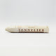 A single Sennelier oil pastel crayon against a white background, displaying the brand name and the word 'Oil Pastel' on the wrapper.