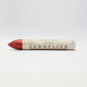 A single Sennelier oil pastel crayon against a white background, displaying the brand name and the word 'Oil Pastel' on the wrapper.