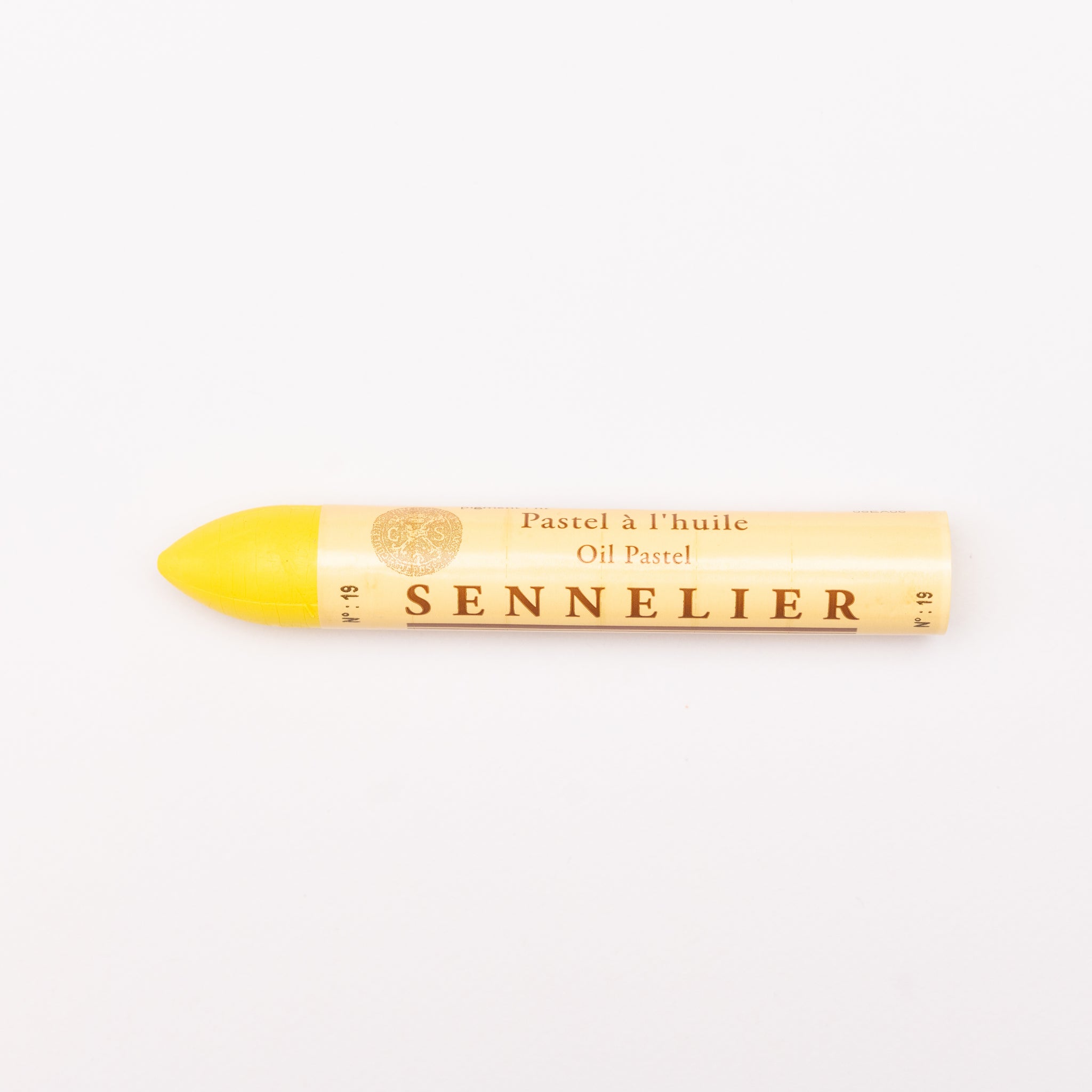 A single Sennelier oil pastel crayon against a white background, displaying the brand name and the word 'Oil Pastel' on the wrapper.