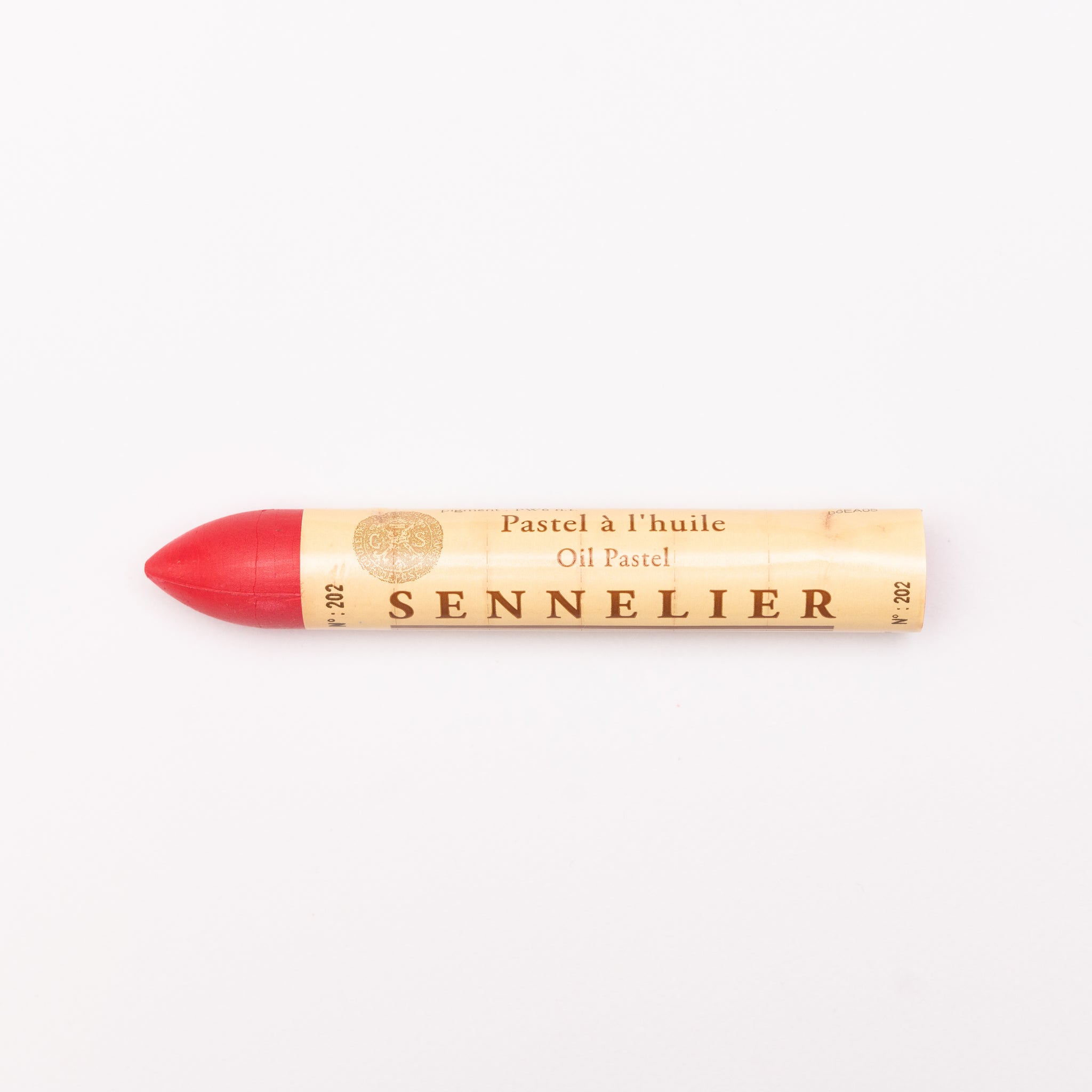 A single Sennelier oil pastel crayon against a white background, displaying the brand name and the word 'Oil Pastel' on the wrapper.