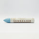 A single Sennelier oil pastel crayon against a white background, displaying the brand name and the word 'Oil Pastel' on the wrapper.