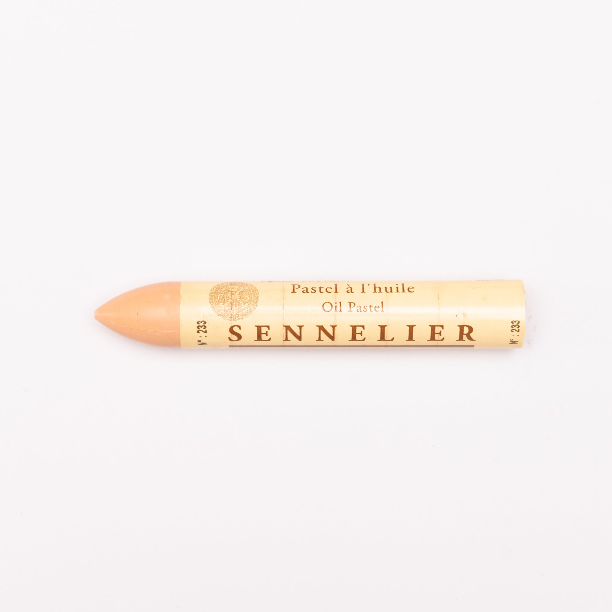 A single Sennelier oil pastel crayon against a white background, displaying the brand name and the word 'Oil Pastel' on the wrapper.