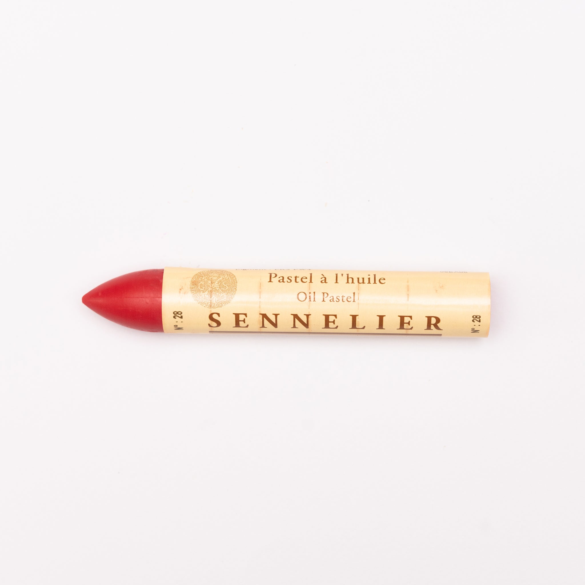 A single Sennelier oil pastel crayon against a white background, displaying the brand name and the word 'Oil Pastel' on the wrapper.