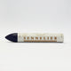 A single Sennelier oil pastel crayon against a white background, displaying the brand name and the word 'Oil Pastel' on the wrapper.