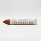 A single Sennelier oil pastel crayon against a white background, displaying the brand name and the word 'Oil Pastel' on the wrapper.