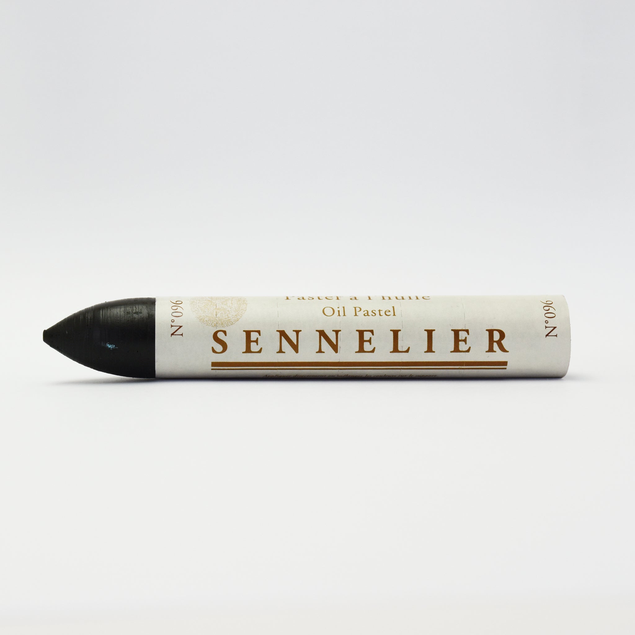 A single Sennelier oil pastel crayon against a white background, displaying the brand name and the word 'Oil Pastel' on the wrapper.