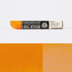 Sennelier oil stick with an orange colour swatches on a white background