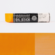 Sennelier oil stick with a orange colour swatch on a white background