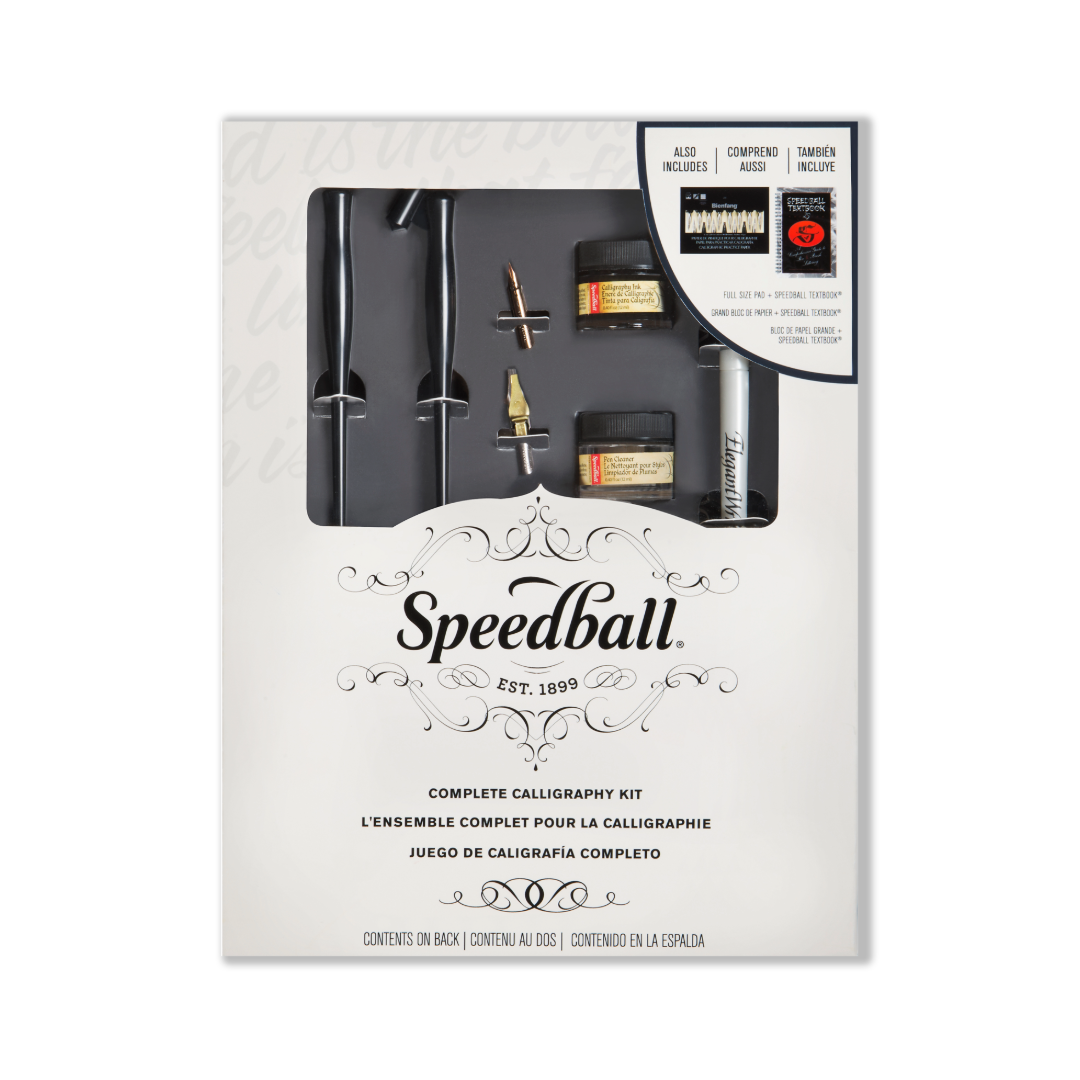 A white box with black speedball labelling and a window cut out showing nibs, nib holders, 2 ink pots and an elegant writer pen.