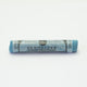 A single blue Sennelier soft pastel on a white background