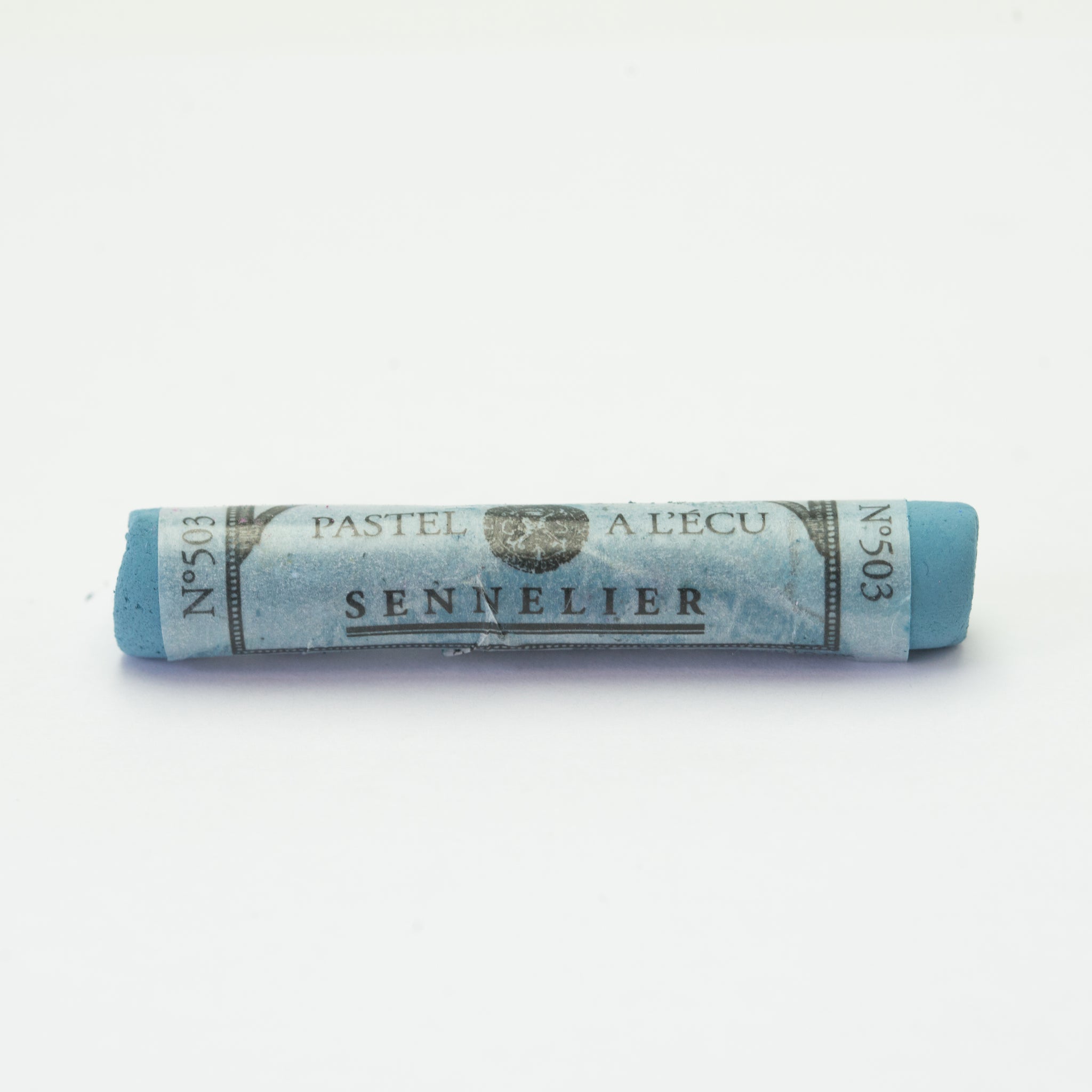 A single blue Sennelier soft pastel on a white background