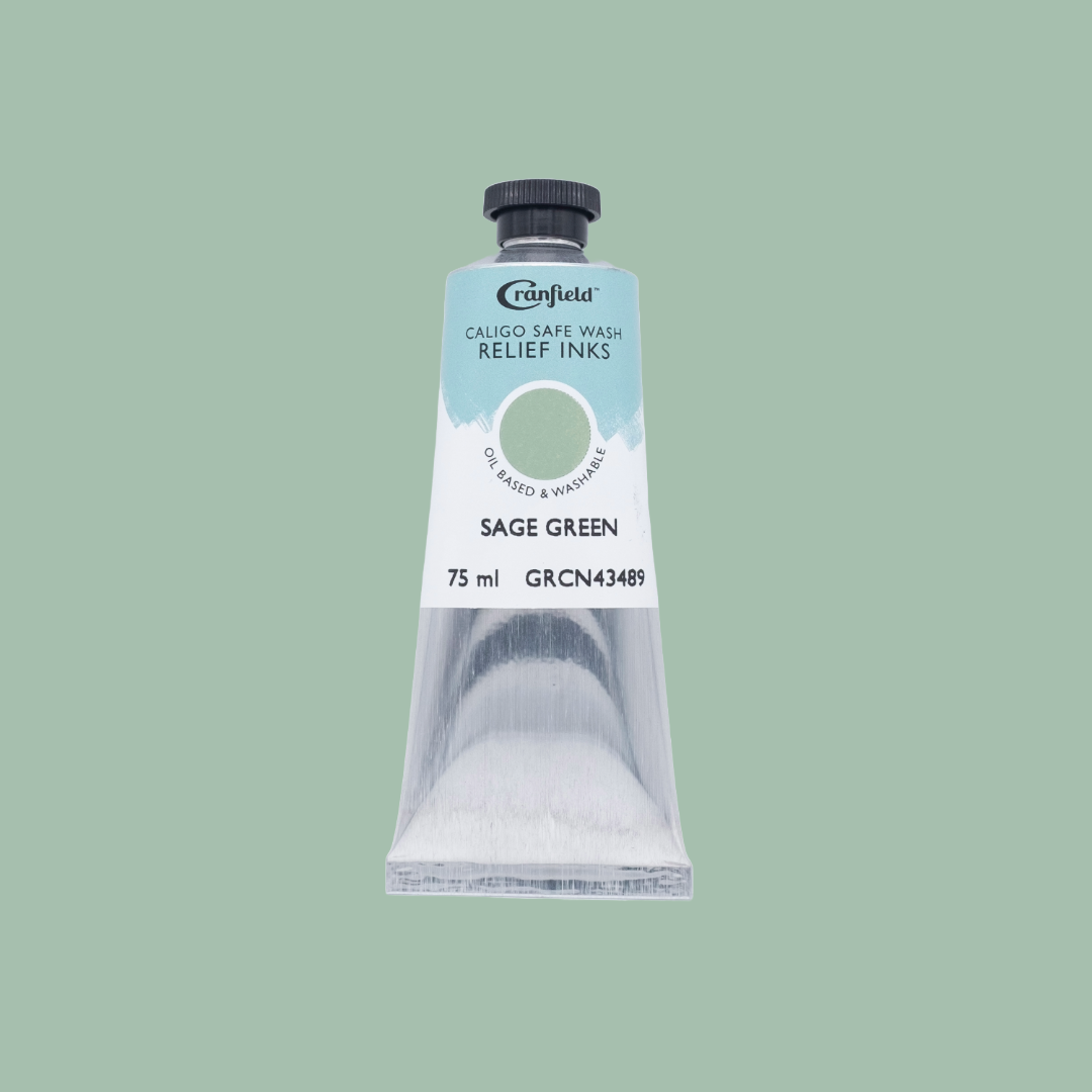 A tube of Sage Green Caligo Safe Wash Relief Ink on a Sage Green background