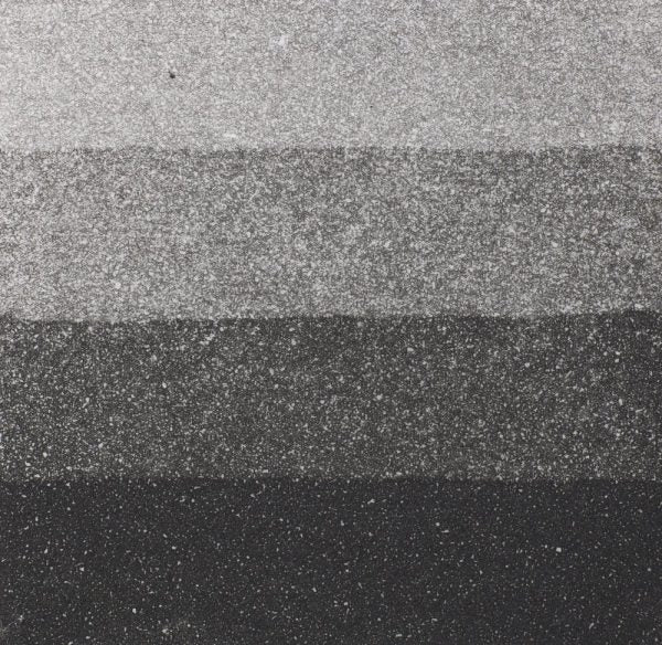 An aquatint test print in black showing 4 depths of tone.