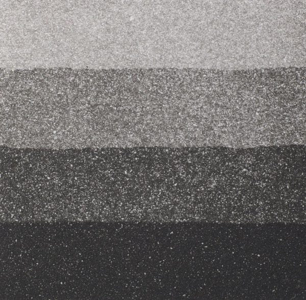 An aquatint test print in black showing 4 depths of tone.