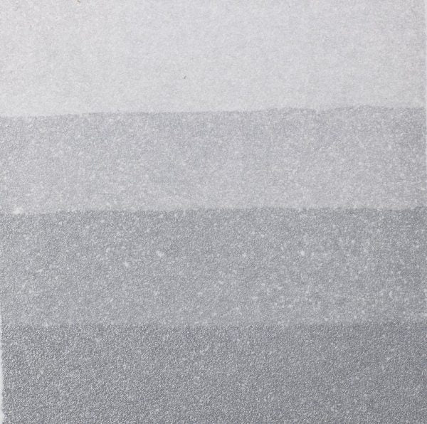 An aquatint test print in silver showing 4 depths of tone.
