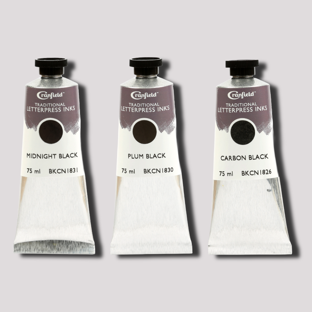 Three tubes of Cranfield Traditional Letterpress Inks on a gray background