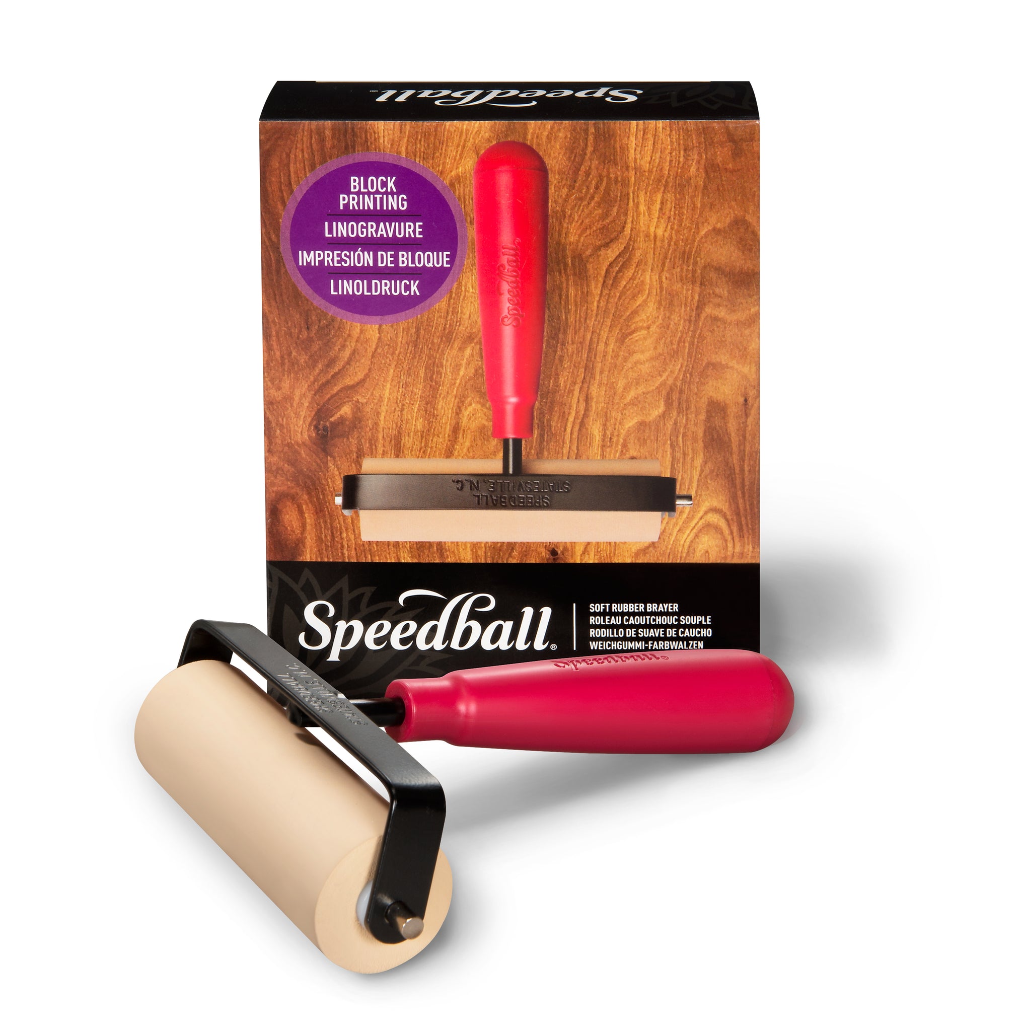 Speedball block printing rubber roller with a red handle and black frame displayed in front of packaging on a white background 