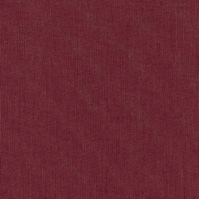 A swatch of solid burgundy Savanna book cloth, used for binding books and stationery items.