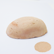 A half egg shaped pastel in pale brown tone, sitting on a white background with a drawn colour swatch.