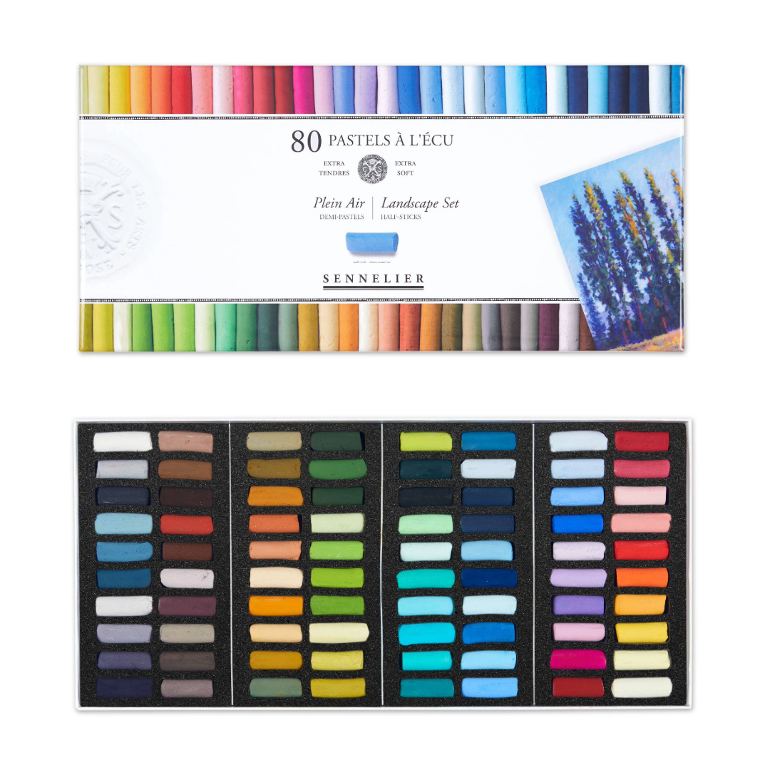 open box of 80 half soft pastels in varying colours and packaging showing a colourful array and landscape illustration.