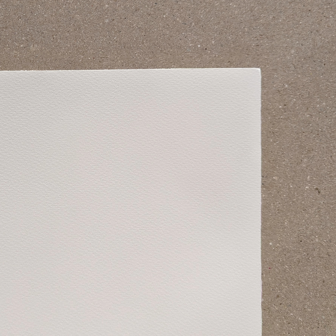 A sheet of Somerset Bookwove White 175gsm paper, with a finely textured wove finish, displayed on a neutral background.