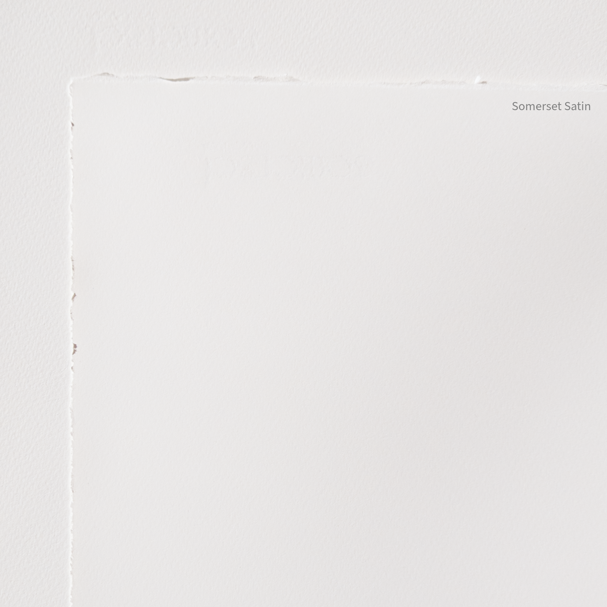 White paper with 'Somerset Satin' text on a slight more textured white paper background