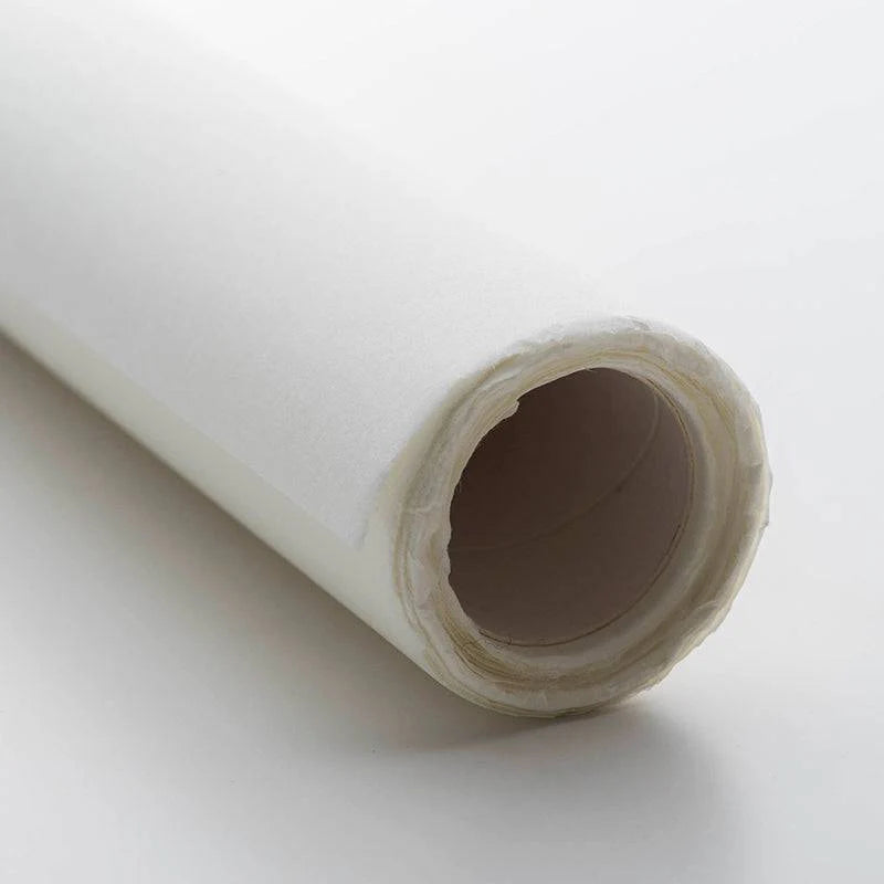 Roll of white paper on a light gray background