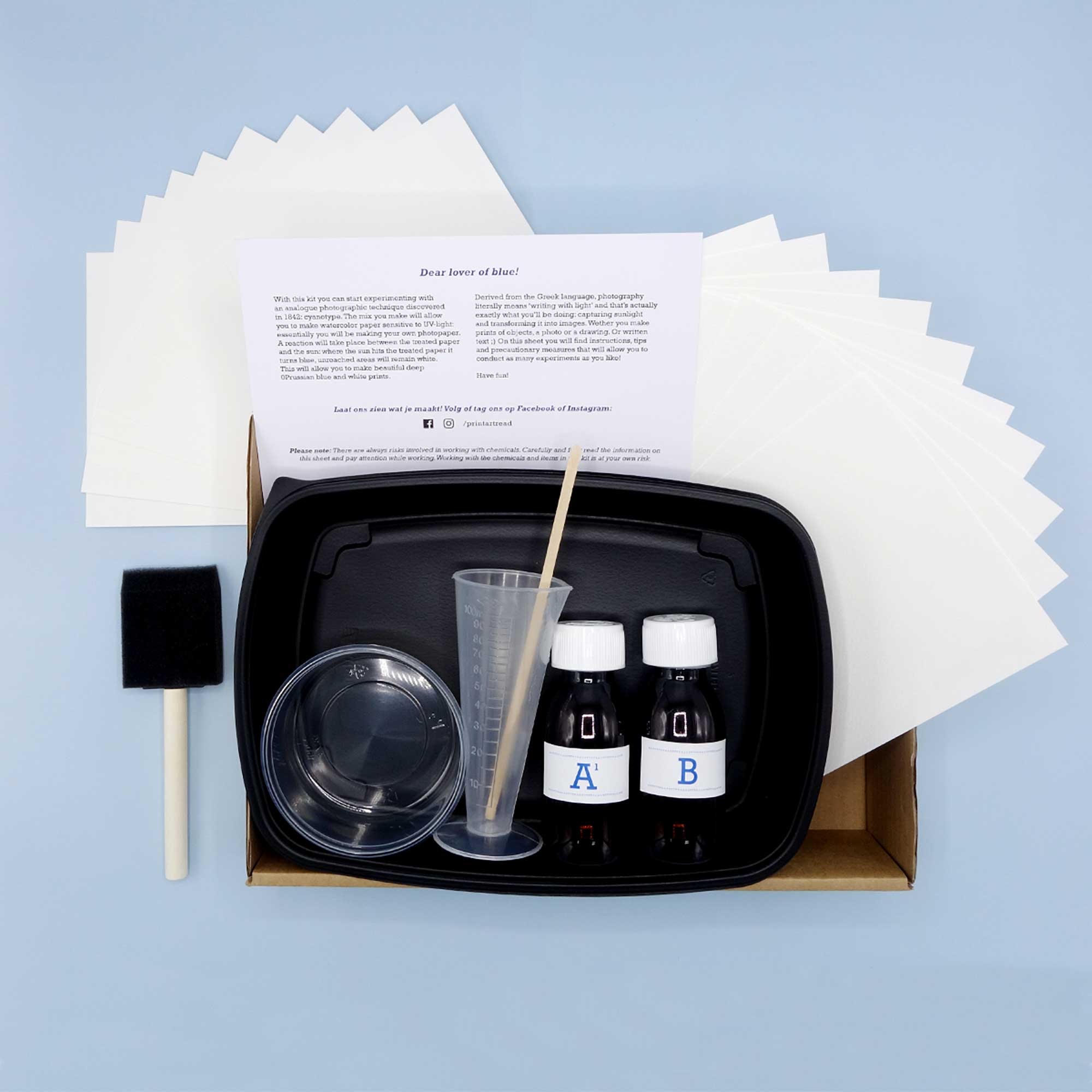 Van Dyke and Cyanotype Duo Paper Kit open and displaying Cyanotype materials