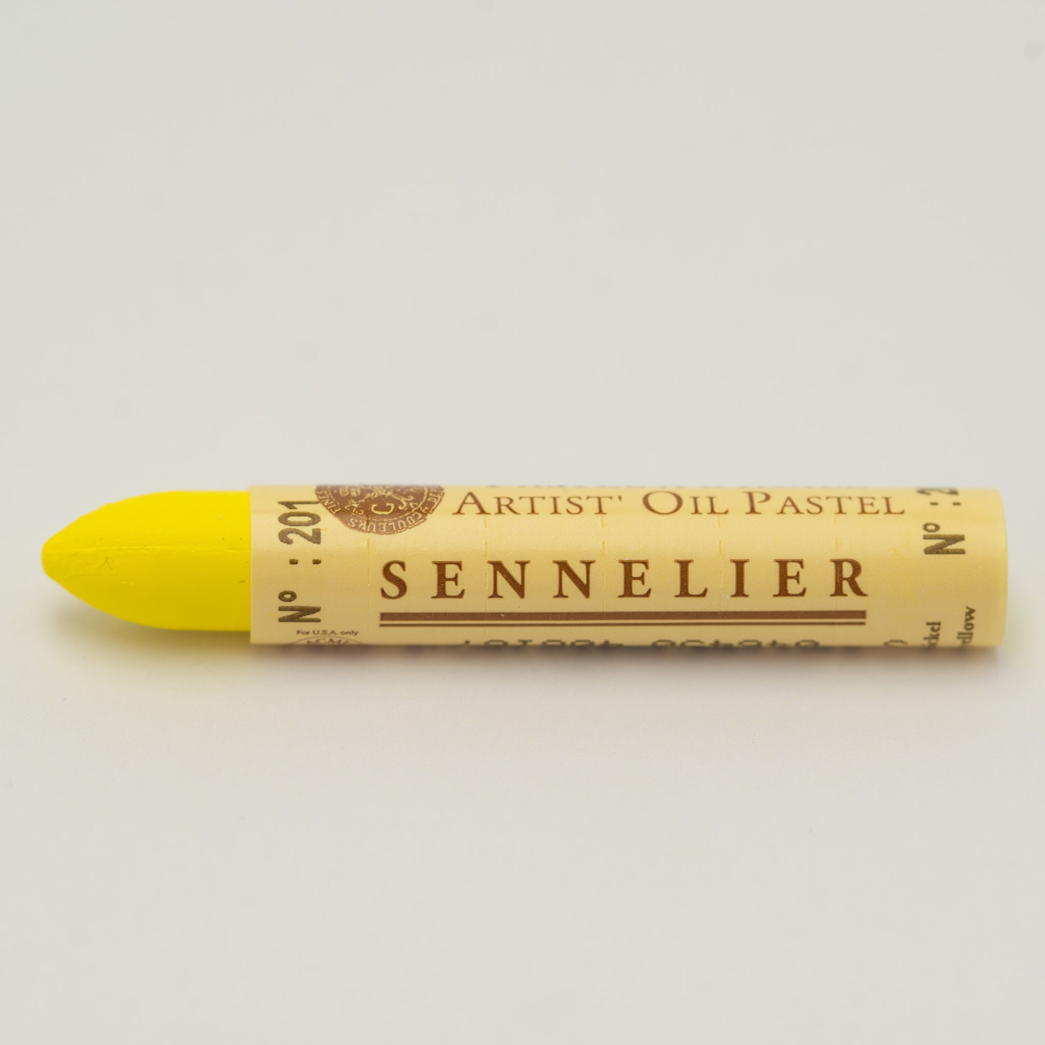 A single Sennelier oil pastel crayon against a white background, displaying the brand name and the words 'Artist Oil Pastel' on the wrapper.