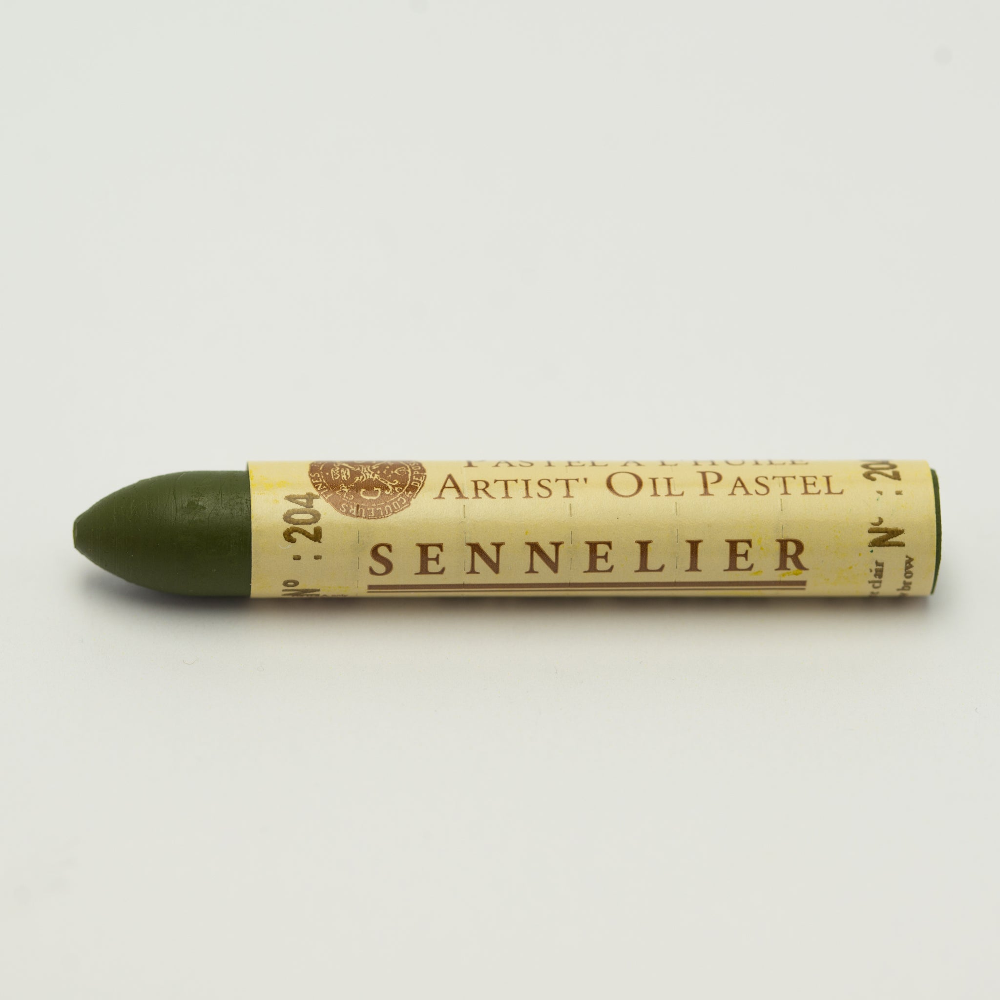 A single Sennelier oil pastel crayon against a white background, displaying the brand name and the words 'Artist Oil Pastel' on the wrapper.