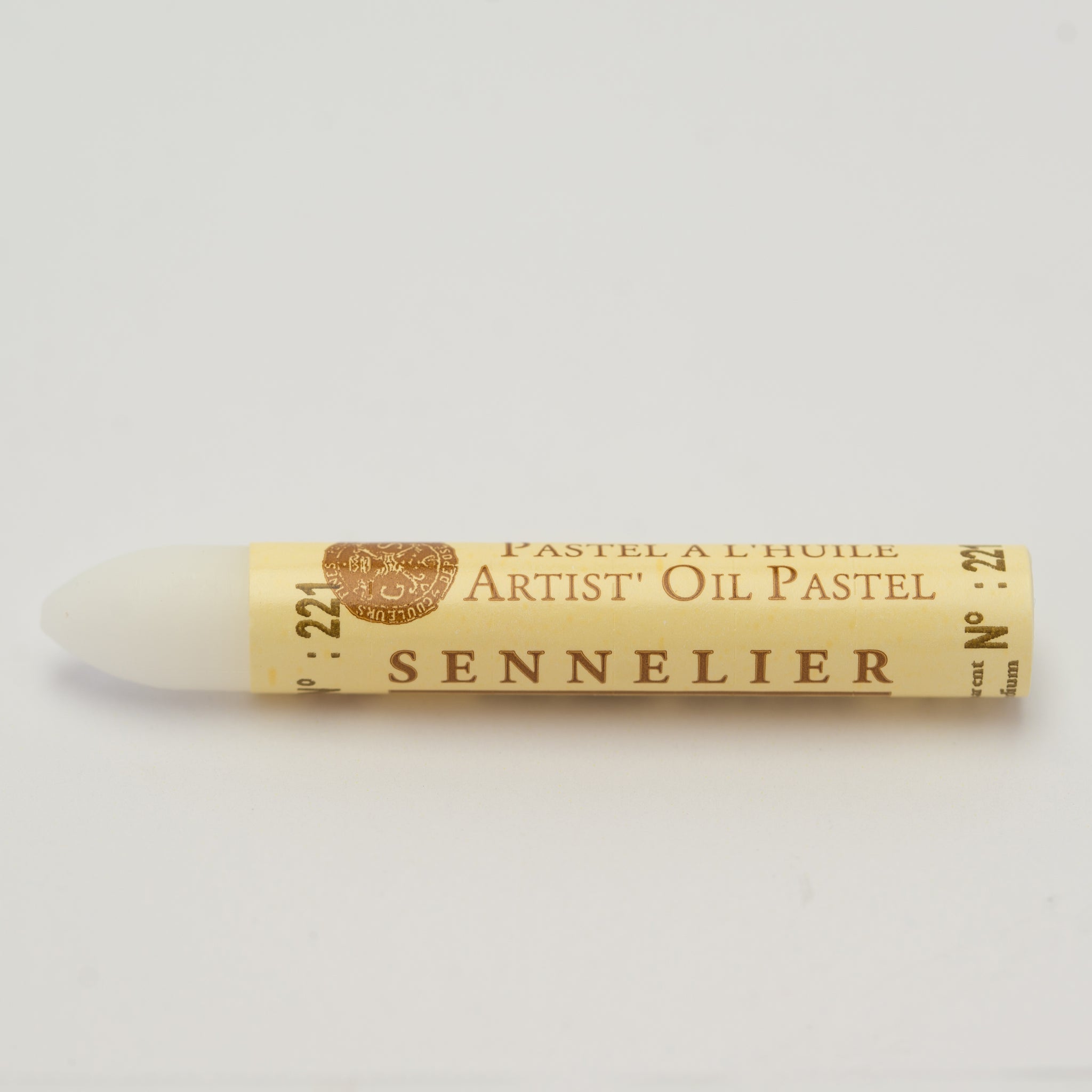 A single Sennelier oil pastel crayon against a white background, displaying the brand name and the words 'Artist Oil Pastel' on the wrapper.