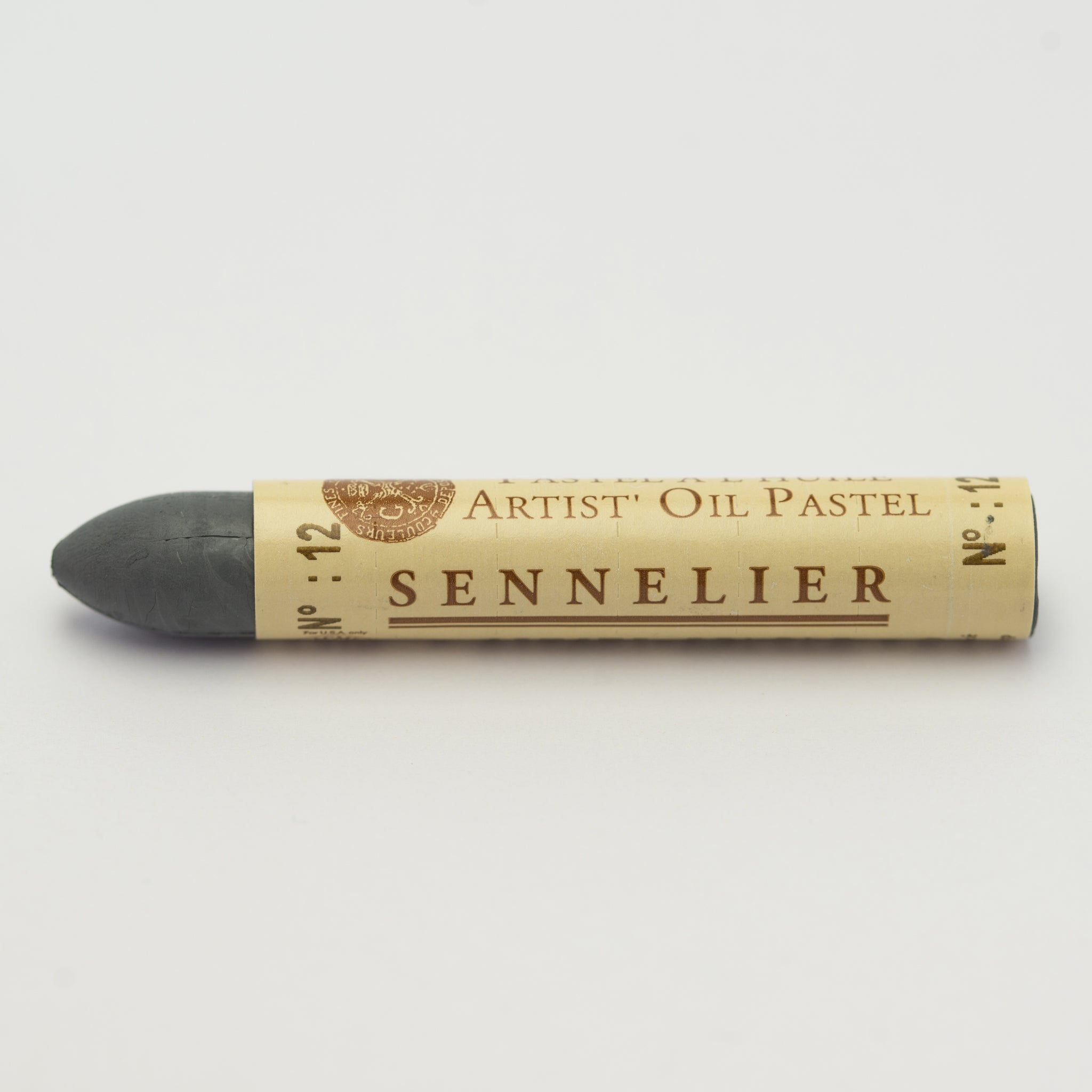A single Sennelier oil pastel crayon against a white background, displaying the brand name and the words 'Artist Oil Pastel' on the wrapper.
