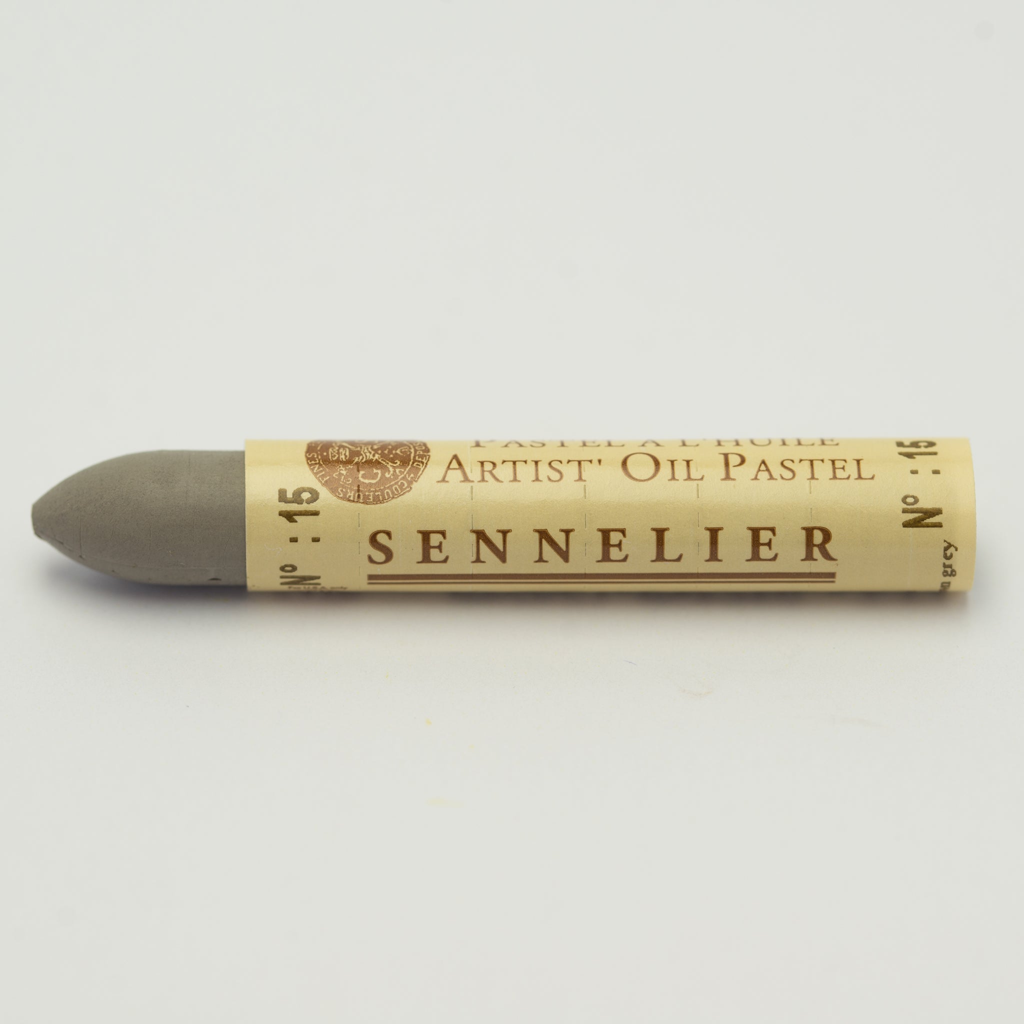A single Sennelier oil pastel crayon against a white background, displaying the brand name and the words 'Artist Oil Pastel' on the wrapper.