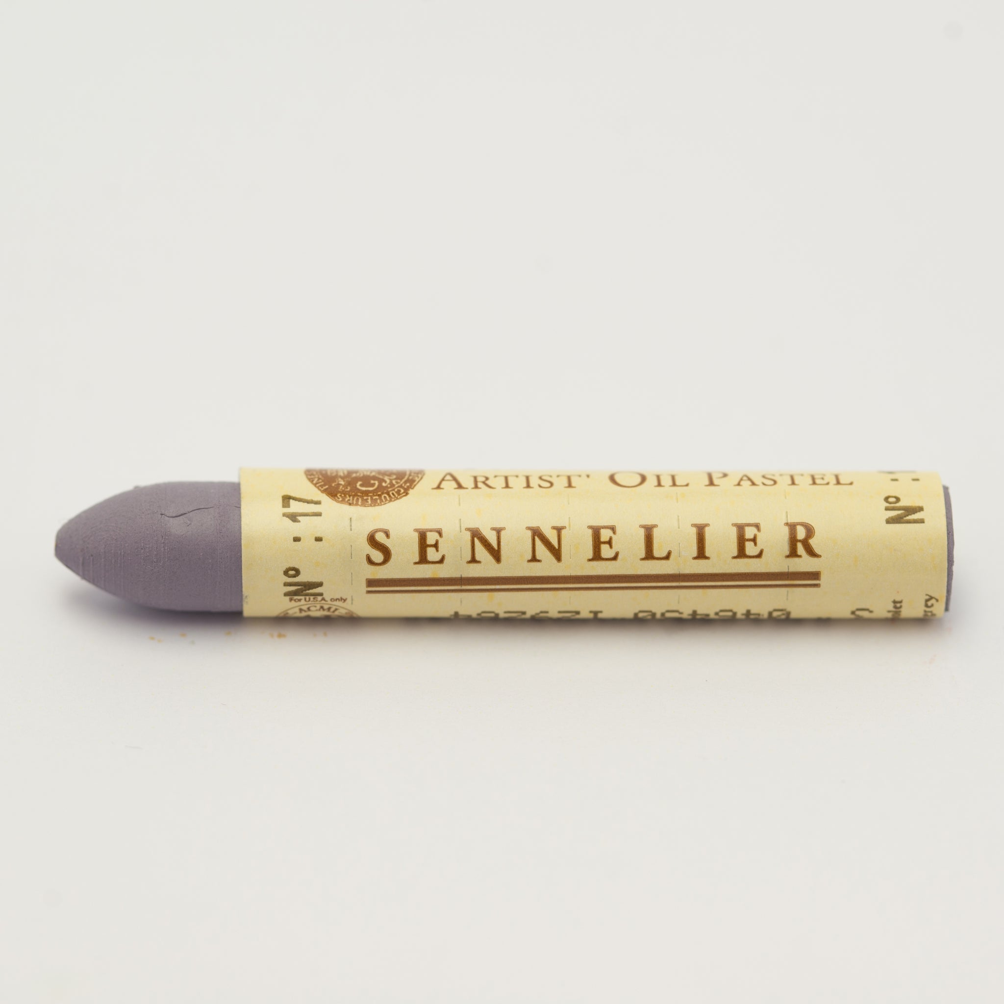 A single Sennelier oil pastel crayon against a white background, displaying the brand name and the words 'Artist Oil Pastel' on the wrapper.