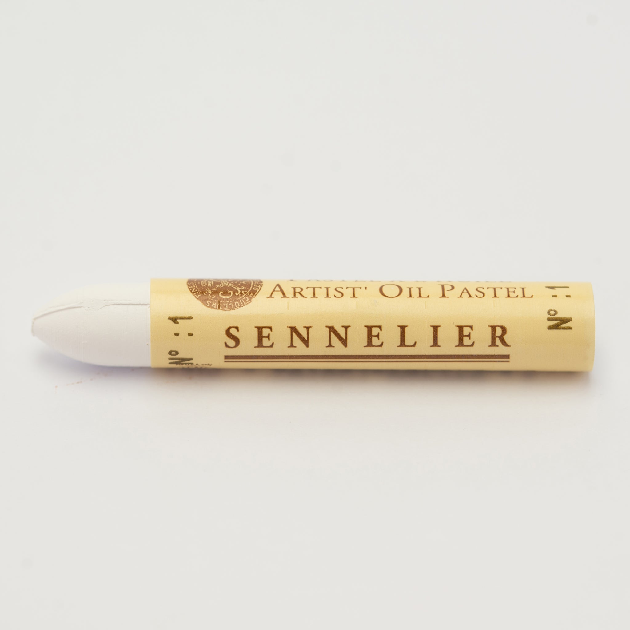 A single Sennelier oil pastel crayon against a white background, displaying the brand name and the words 'Artist Oil Pastel' on the wrapper.