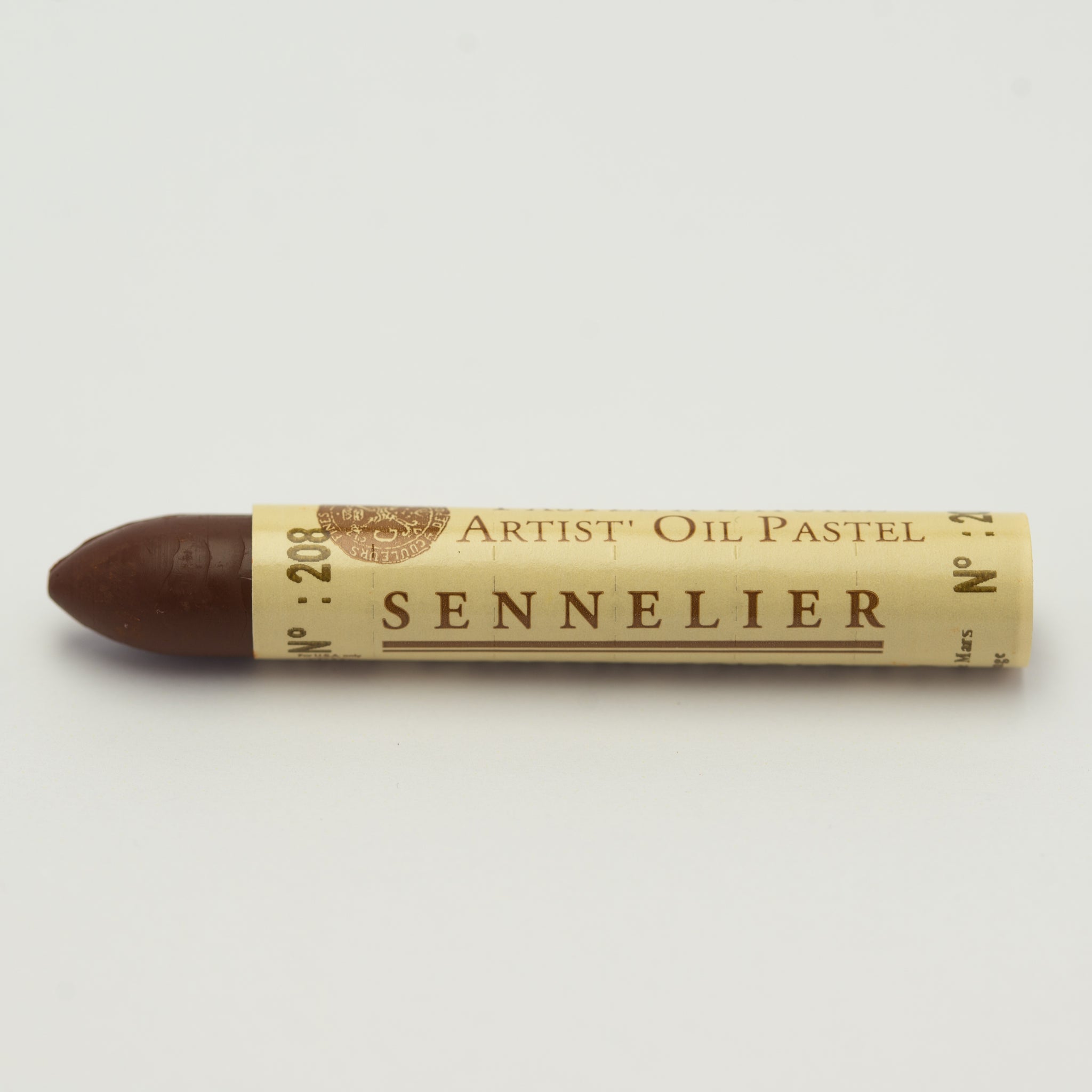 A single Sennelier oil pastel crayon against a white background, displaying the brand name and the words 'Artist Oil Pastel' on the wrapper.
