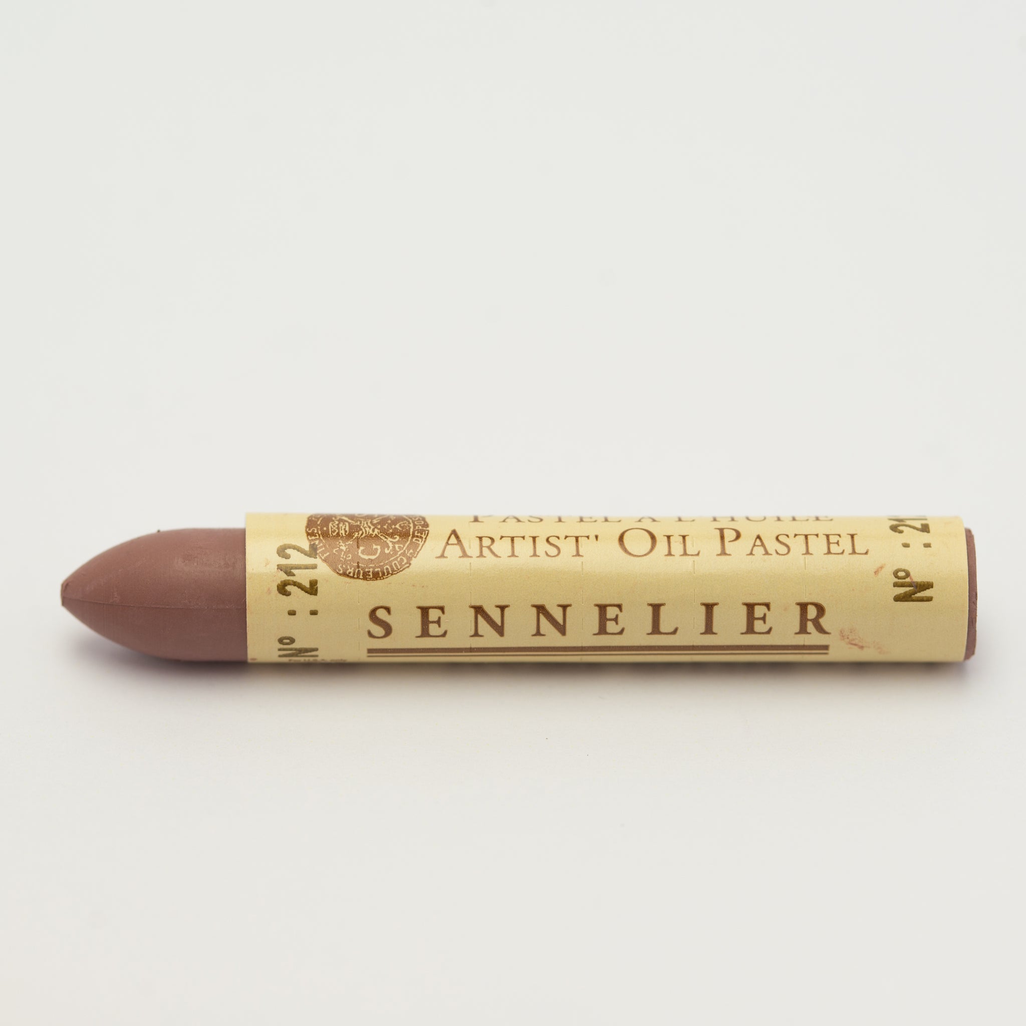 A single Sennelier oil pastel crayon against a white background, displaying the brand name and the words 'Artist Oil Pastel' on the wrapper.