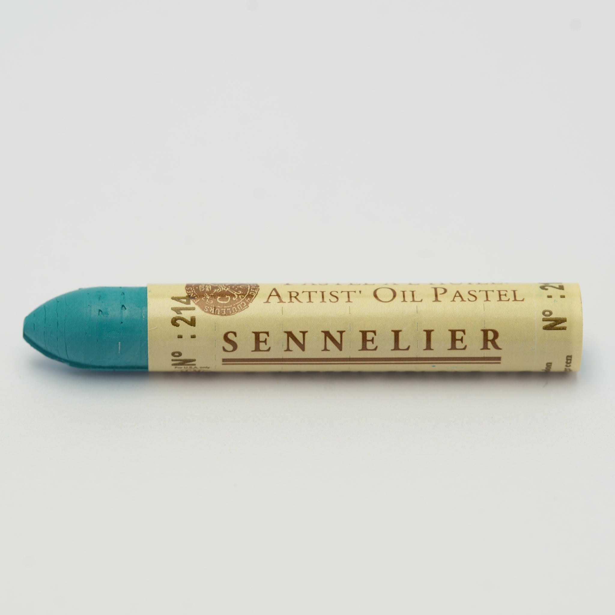 A single Sennelier oil pastel crayon against a white background, displaying the brand name and the words 'Artist Oil Pastel' on the wrapper.