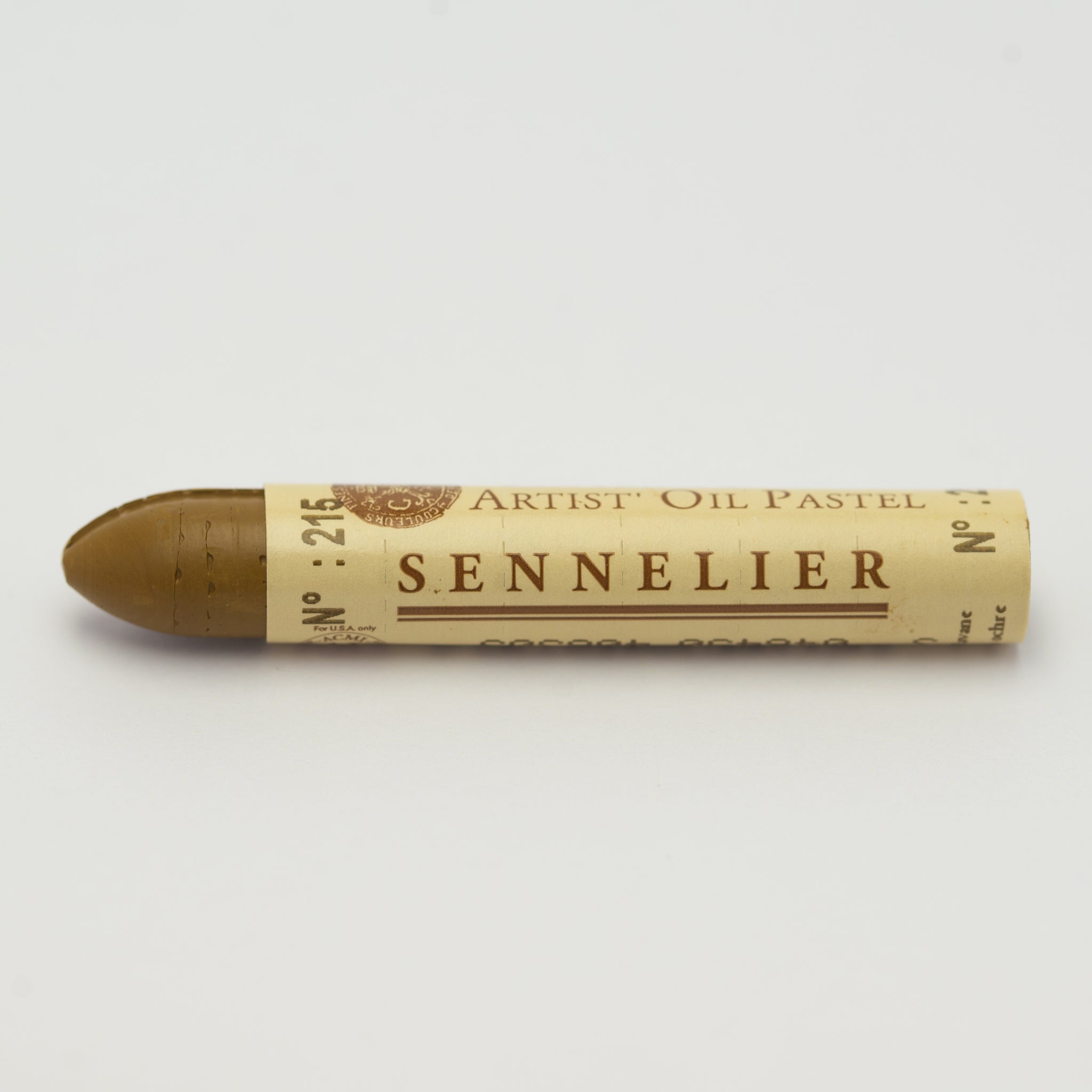 A single Sennelier oil pastel crayon against a white background, displaying the brand name and the words 'Artist Oil Pastel' on the wrapper.