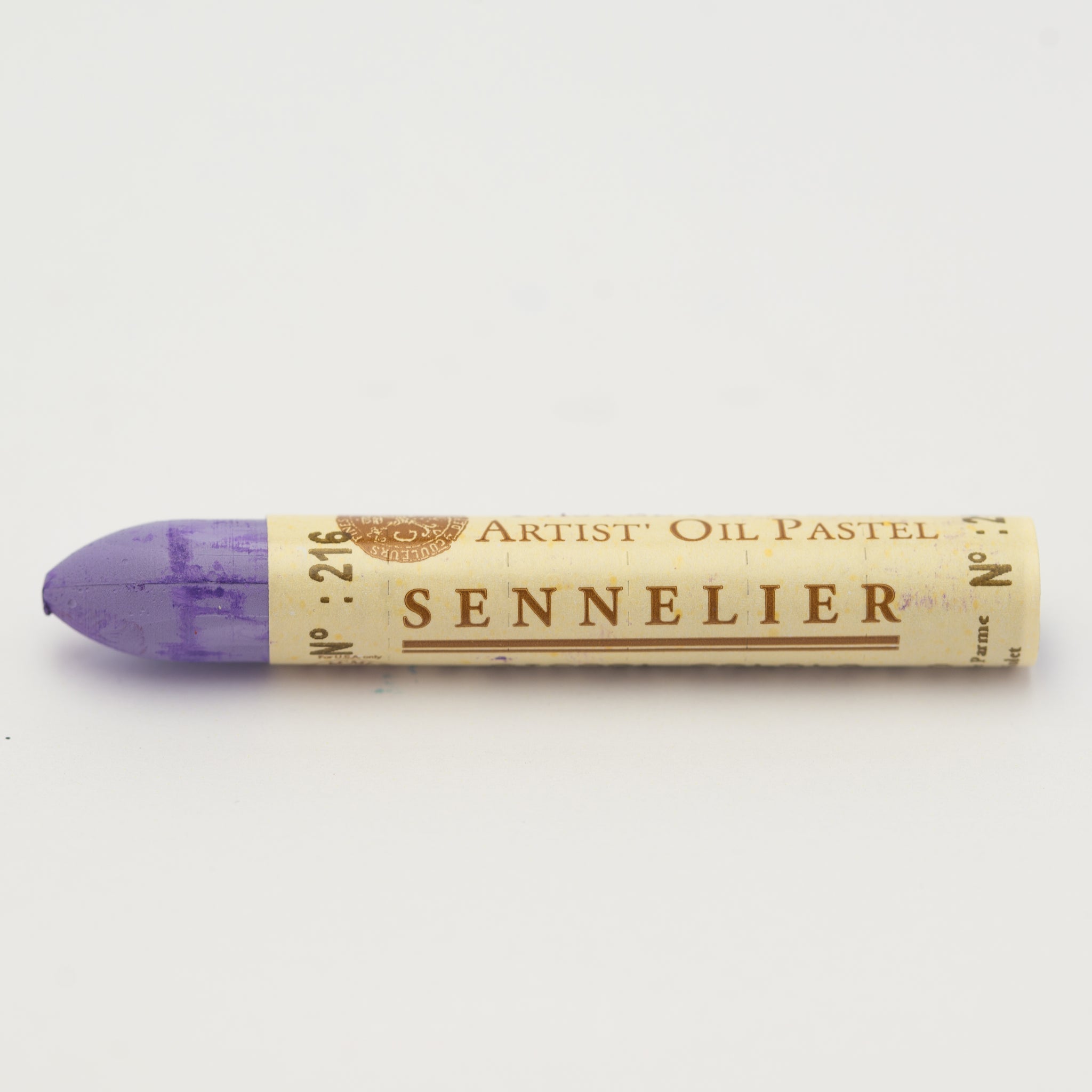 A single Sennelier oil pastel crayon against a white background, displaying the brand name and the words 'Artist Oil Pastel' on the wrapper.