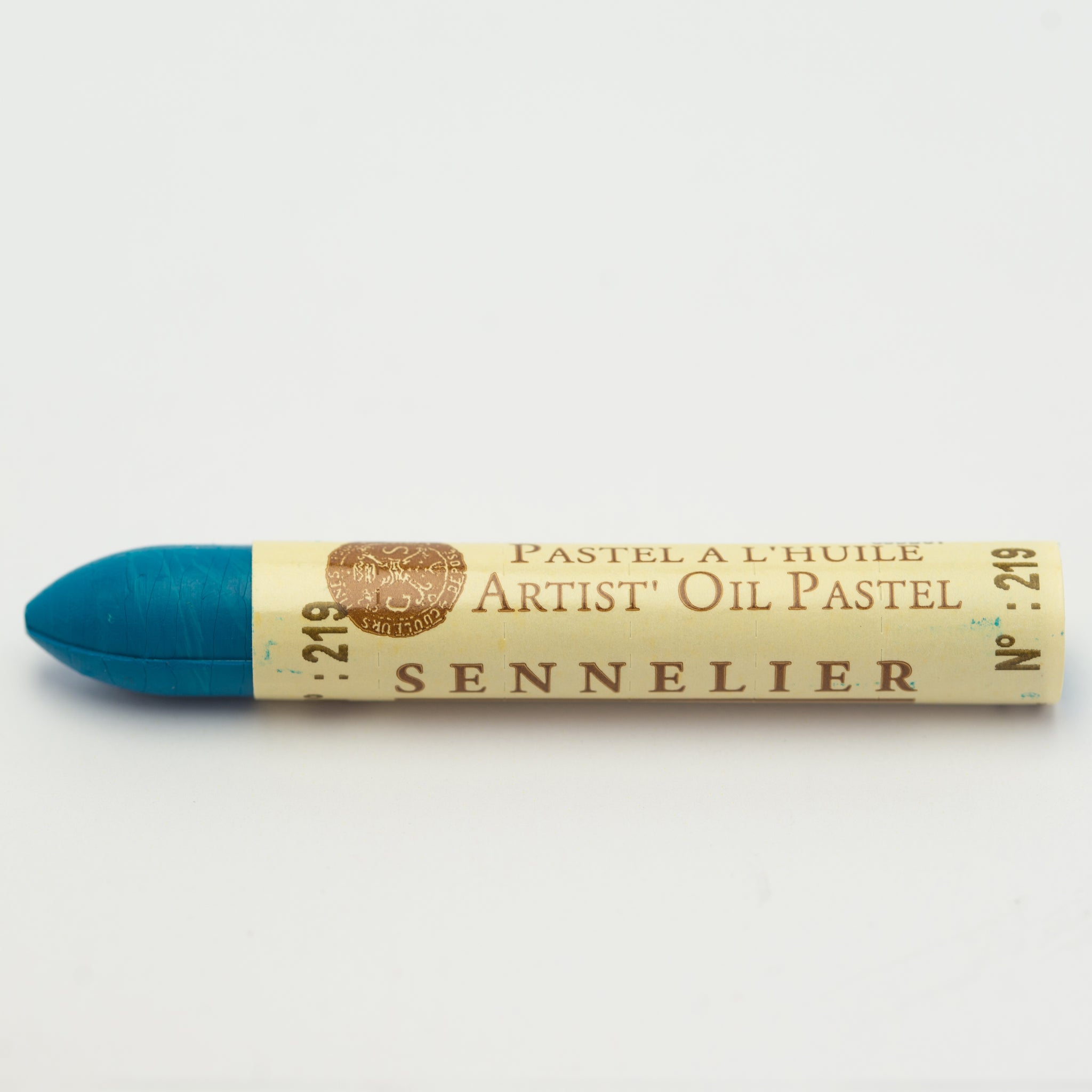 A single Sennelier oil pastel crayon against a white background, displaying the brand name and the words 'Artist Oil Pastel' on the wrapper.