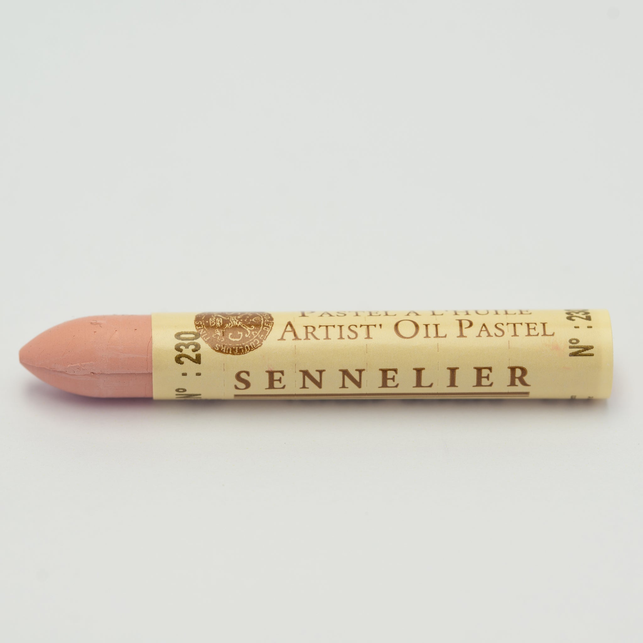 A single Sennelier oil pastel crayon against a white background, displaying the brand name and the words 'Artist Oil Pastel' on the wrapper.