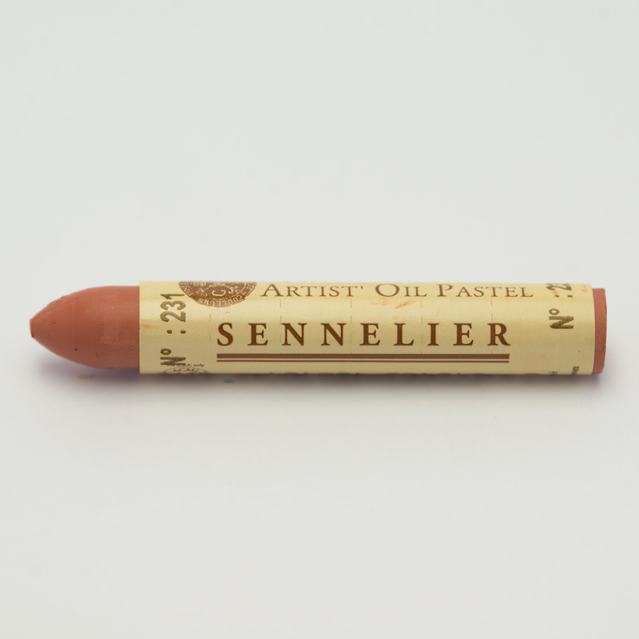A single Sennelier oil pastel crayon against a white background, displaying the brand name and the words 'Artist Oil Pastel' on the wrapper.