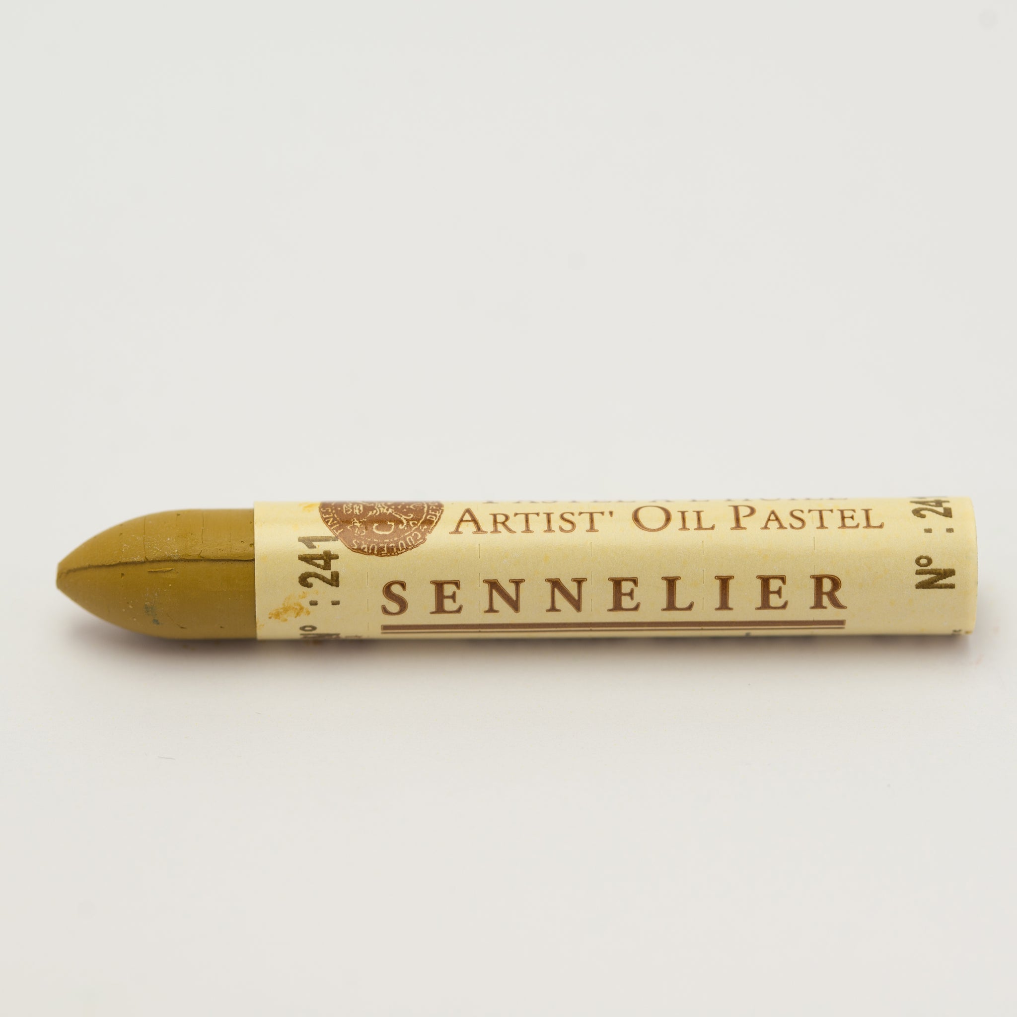 A single Sennelier oil pastel crayon against a white background, displaying the brand name and the words 'Artist Oil Pastel' on the wrapper.