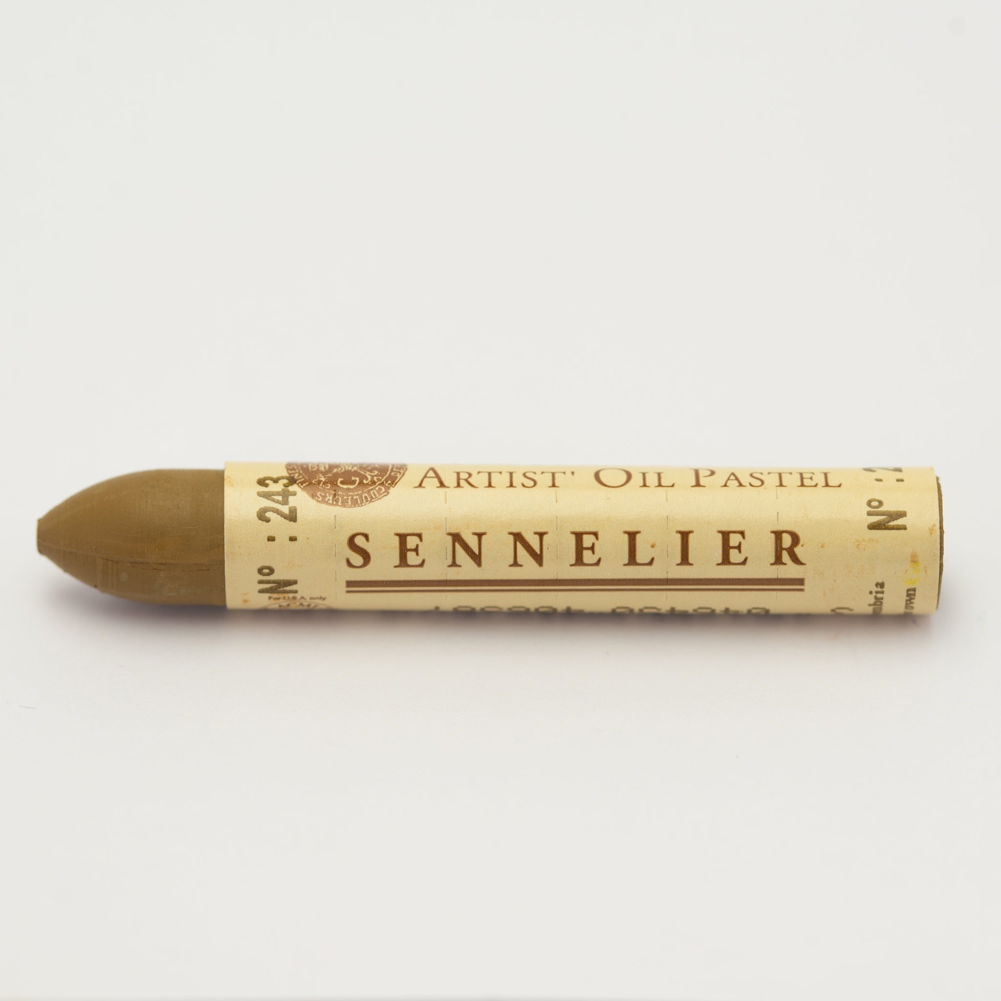 A single Sennelier oil pastel crayon against a white background, displaying the brand name and the words 'Artist Oil Pastel' on the wrapper.
