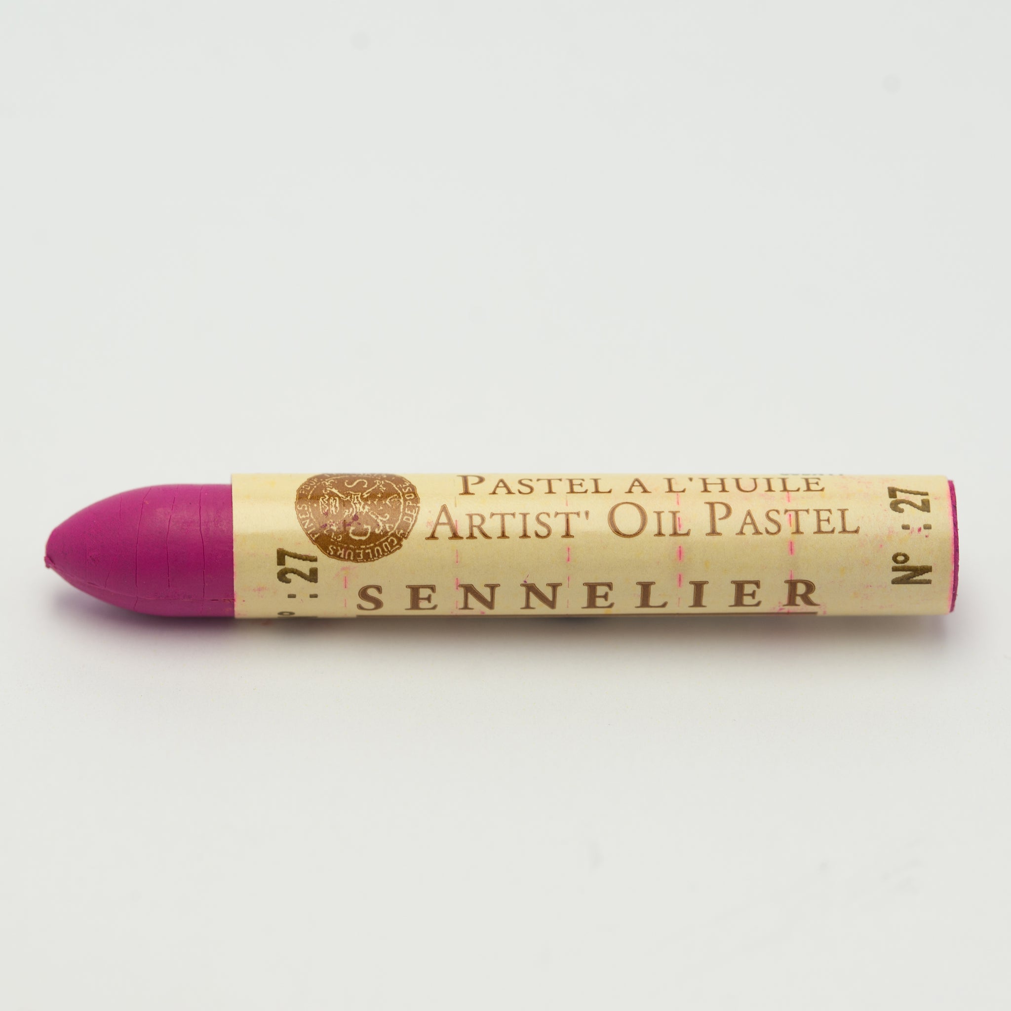 A single Sennelier oil pastel crayon against a white background, displaying the brand name and the words 'Artist Oil Pastel' on the wrapper.
