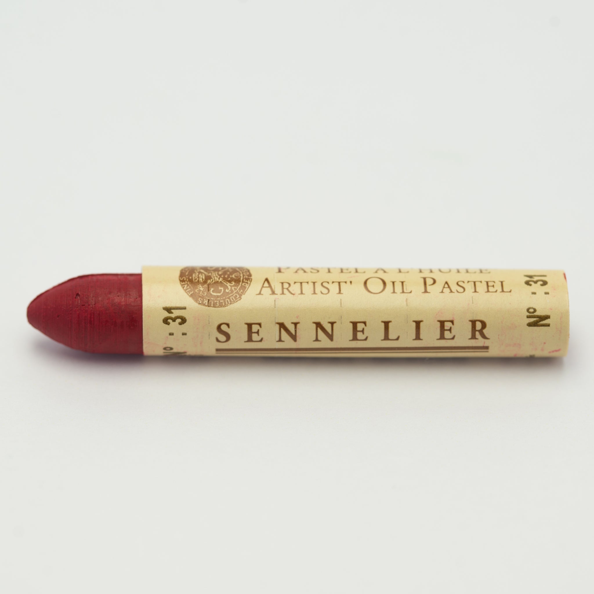 A single Sennelier oil pastel crayon against a white background, displaying the brand name and the words 'Artist Oil Pastel' on the wrapper.