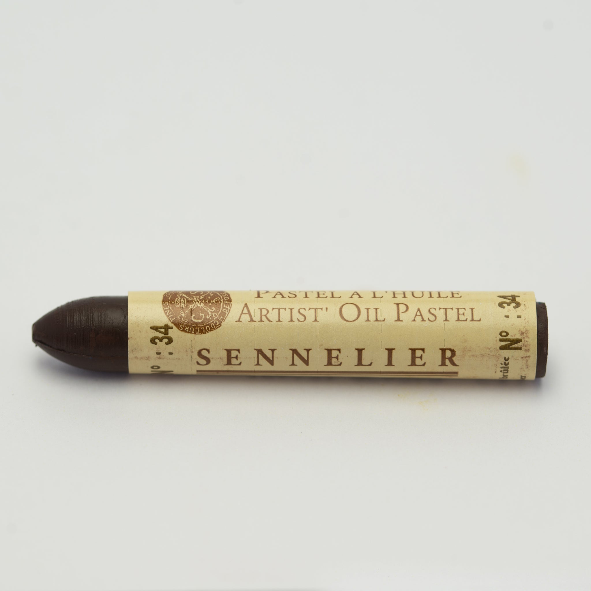 A single Sennelier oil pastel crayon against a white background, displaying the brand name and the words 'Artist Oil Pastel' on the wrapper.