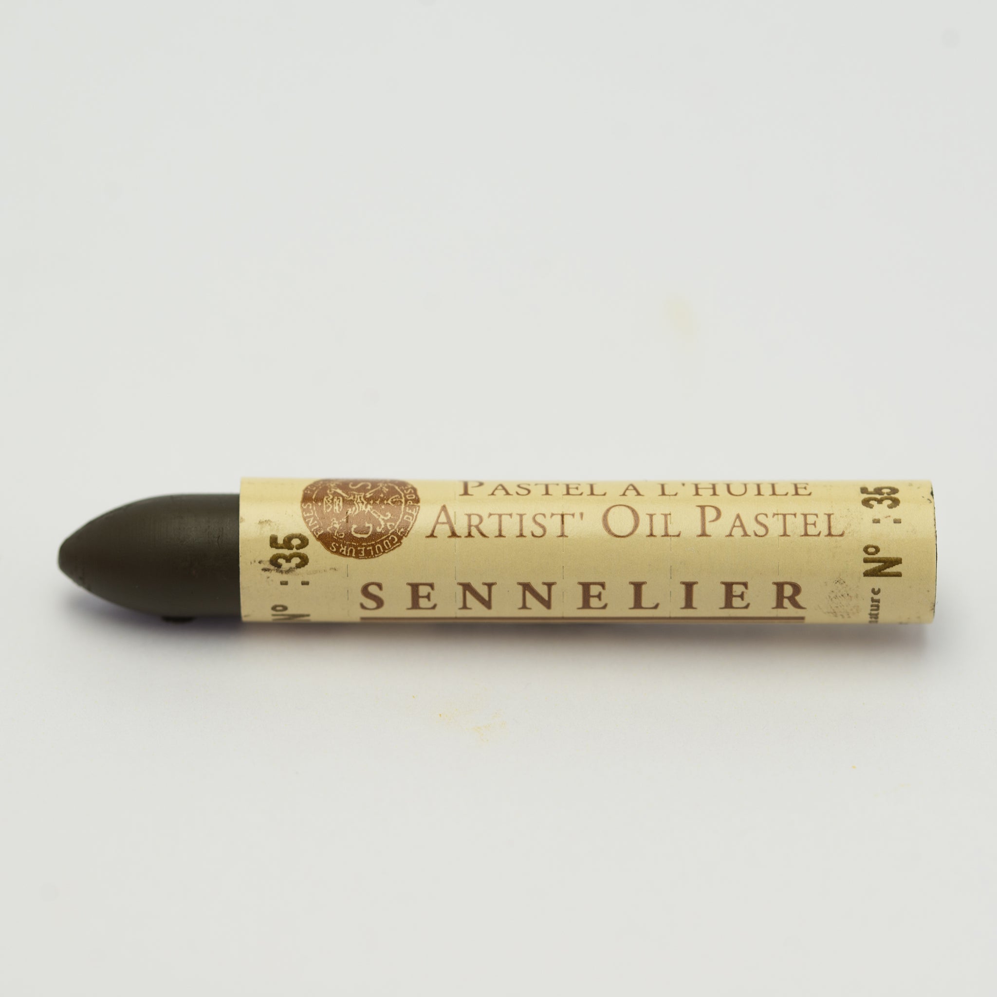 A single Sennelier oil pastel crayon against a white background, displaying the brand name and the words 'Artist Oil Pastel' on the wrapper.